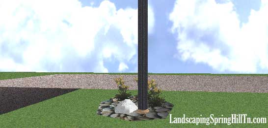 River Rock with iron edging landscape design and installation in Tennessee.